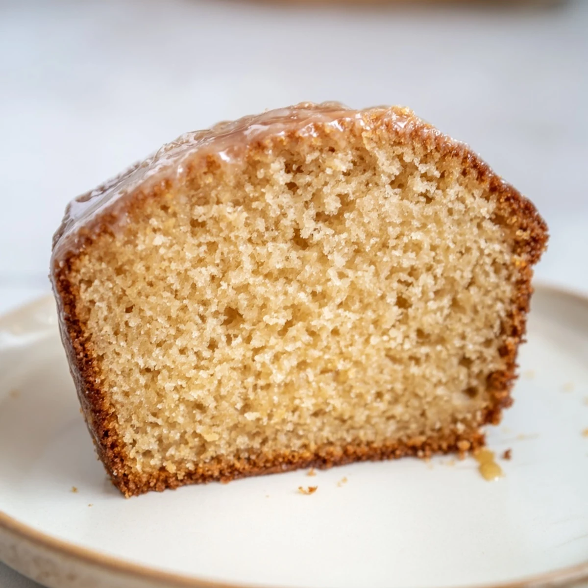 Picture this: baked Soft Glow Golden Honey Pound Cake glistening, with a golden crumb, inviting you to enjoy.