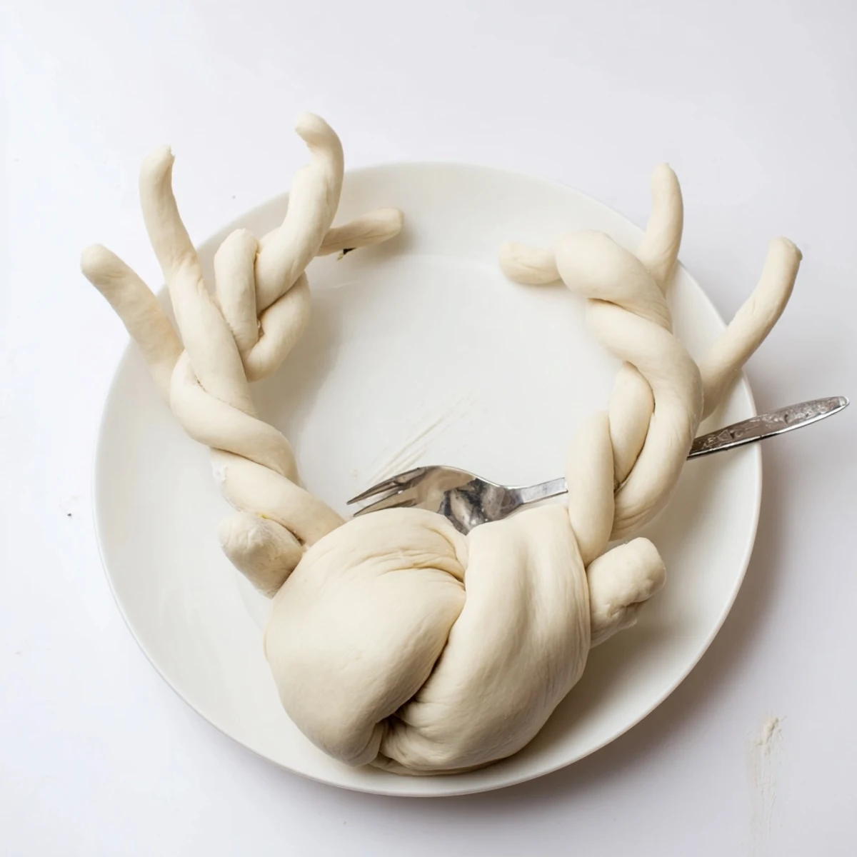 Warm, cheesy Spinach Dip filling the Reindeer Antler bread, perfect party food for sharing.