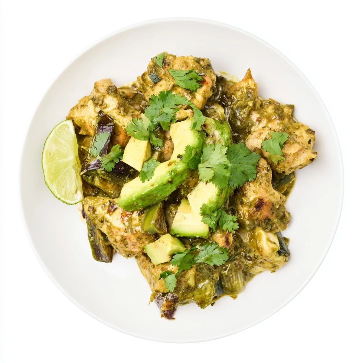 Served Chicken Chili Verde with creamy avocado slices, radishes, and warm corn tortillas for a complete, gluten-free Mexican dinner.