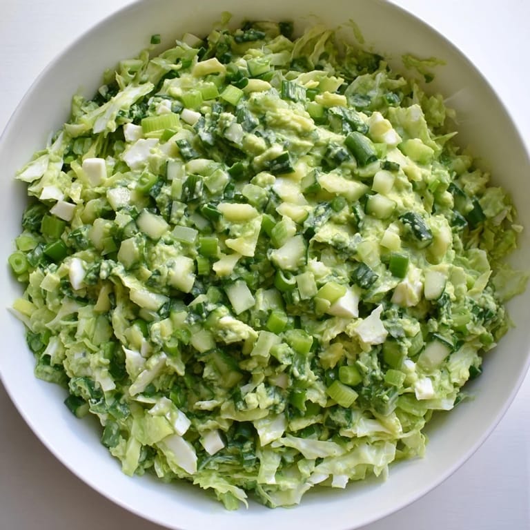 This Green Goddess Cabbage Dip recipe shows off a refreshing side with crunchy, chopped vegetables tossed in dressing.