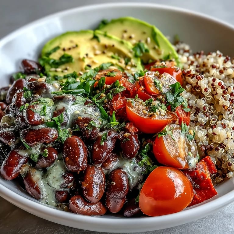 Colorful medley of chickpeas, black beans, and kidney beans tossed with crisp veggies in a zesty lemon dressing.