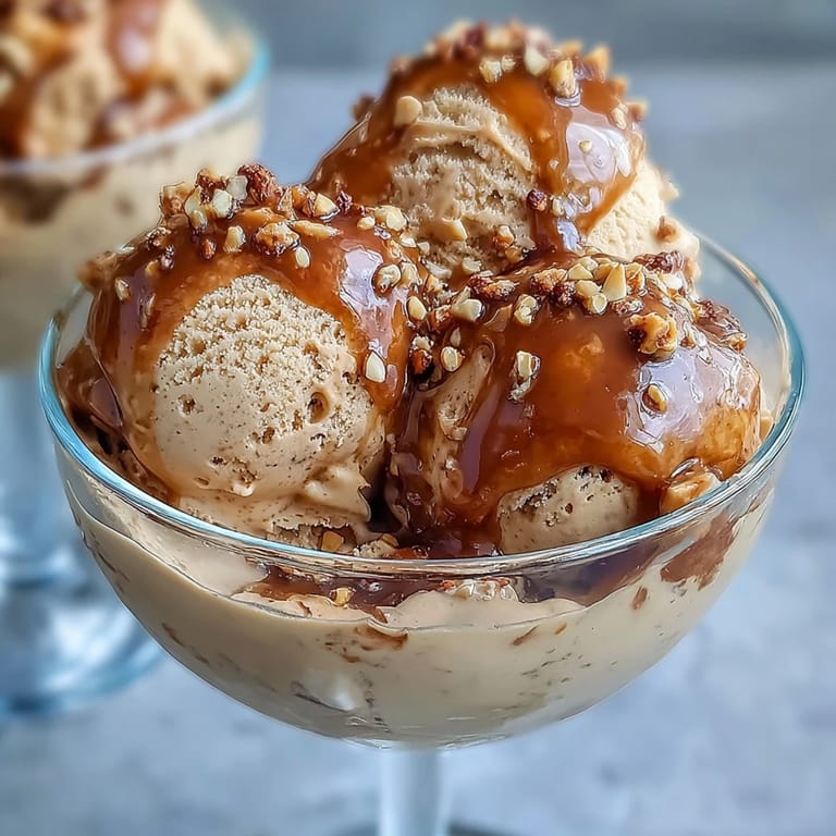 Easy homemade Hojicha Affogato dessert in a clear glass, featuring creamy vanilla ice cream and rich, roasted green tea.